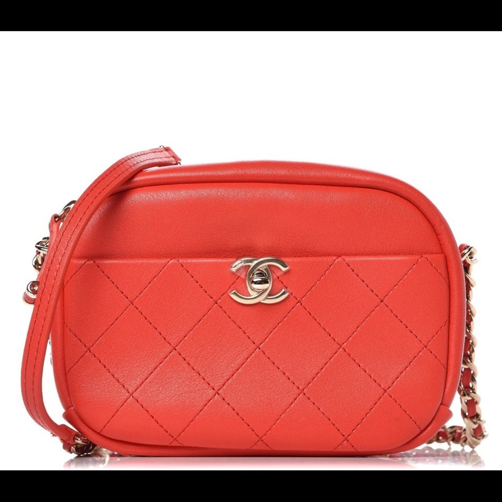 CHANEL goatskin quilted small casual trip camera bag in red/coral